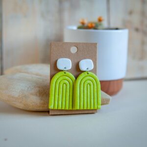 chartreuse green dangly earrings with imperfect white square above